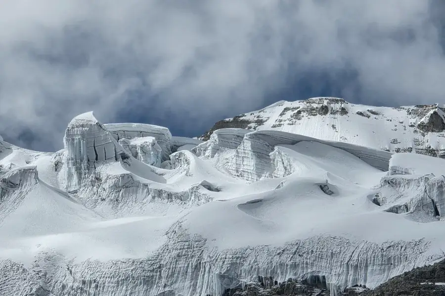 Layered ice and snow formations in a high-mountain environment